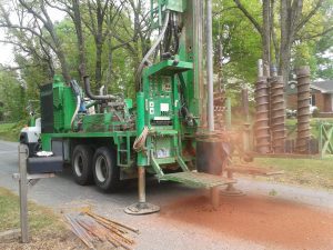 Canterra Combo Rig utilizing air rotary to install a groundwater monitor well in a residential area